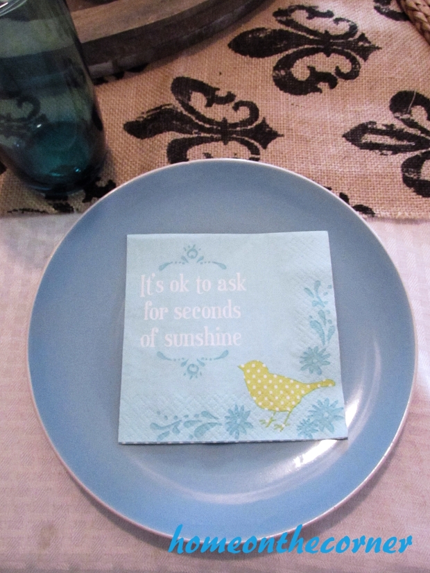 truquoise and white spring tablescape plate and napkin