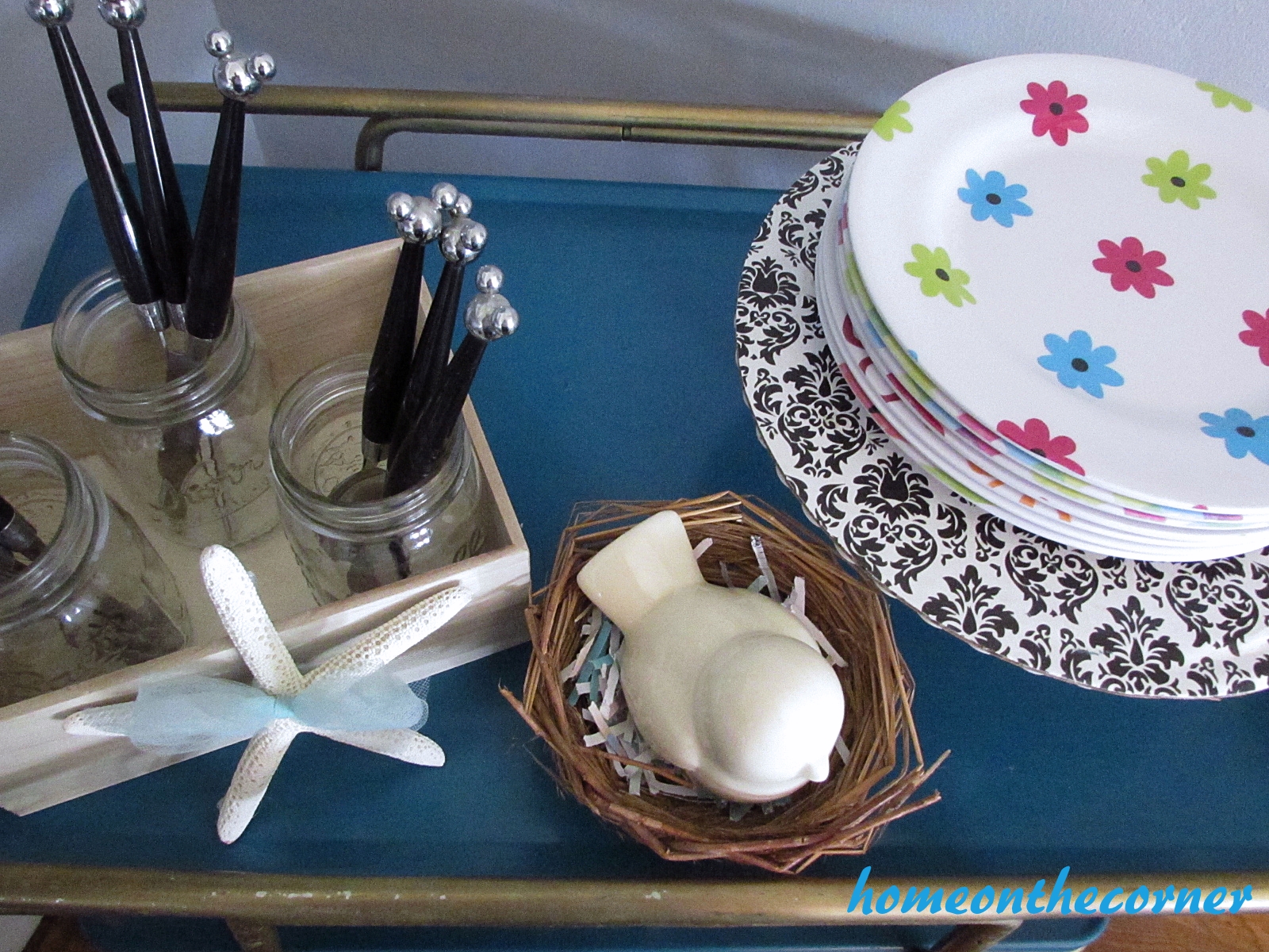 turquoise and white spring tablescape bar cart top