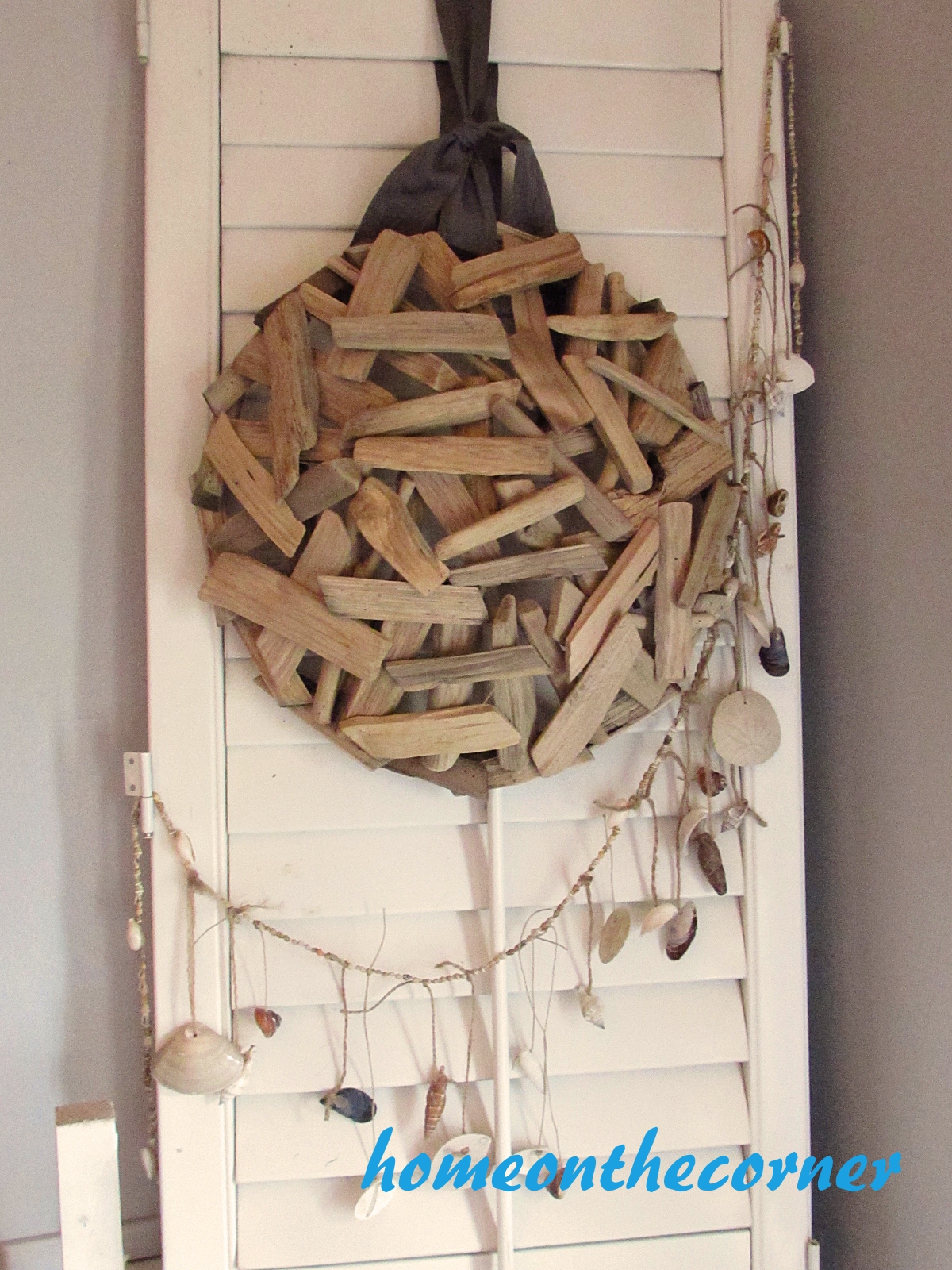 dining room refresh driftwood bowl seashell garland