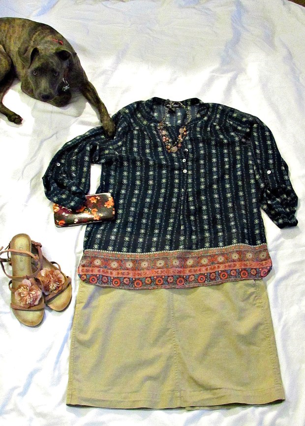 Turquoise fashions sheer top, khaki skirt