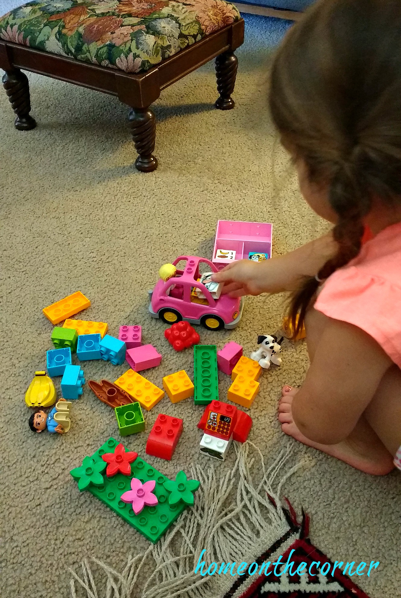 Pley blocks, people, car