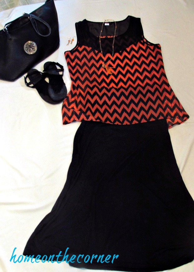 finds and fashions orange chevron shirt black skirt