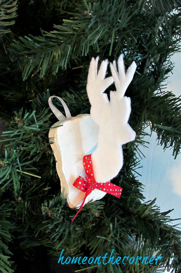 faux-deer-ornament-with-red-ribbon