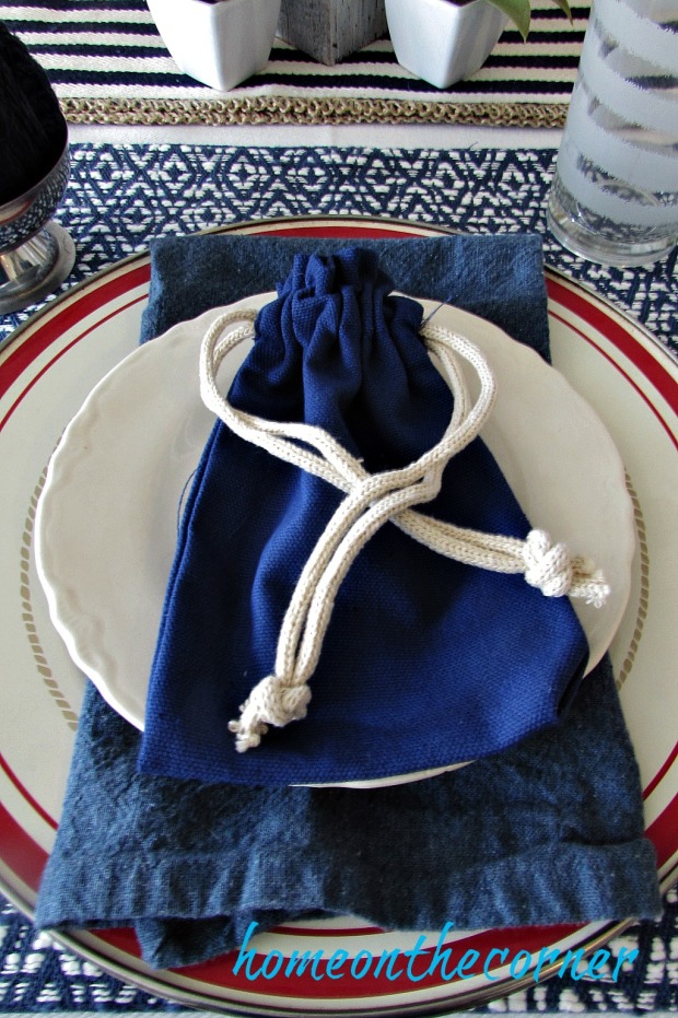tablescapes 2017 blue and white with red and blue bags