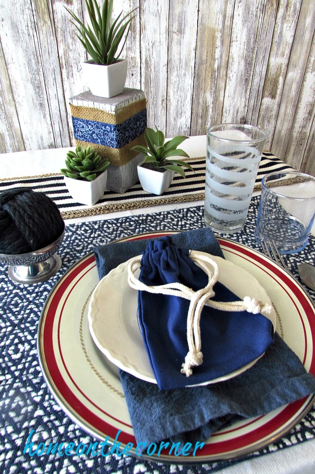 tablescapes 2017 navy and white with succulents and blue bag