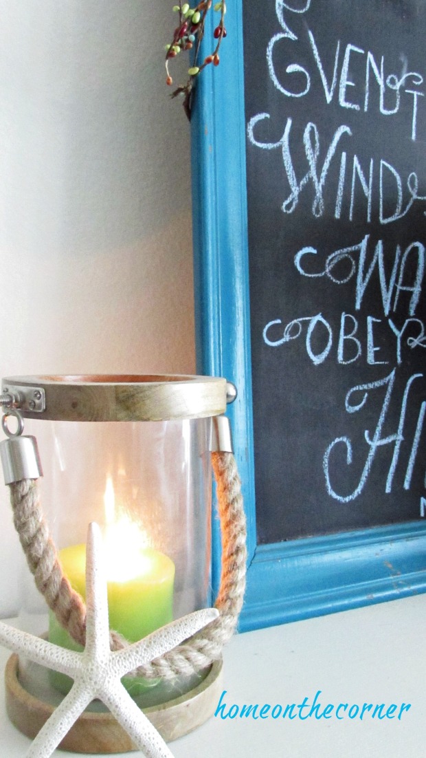 fall 2017 living room mantle candle and chalkboard