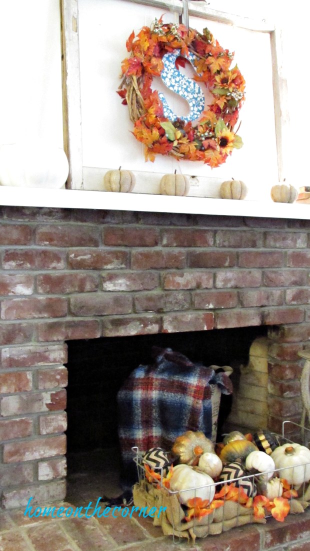 fall family room basket of pumpkins