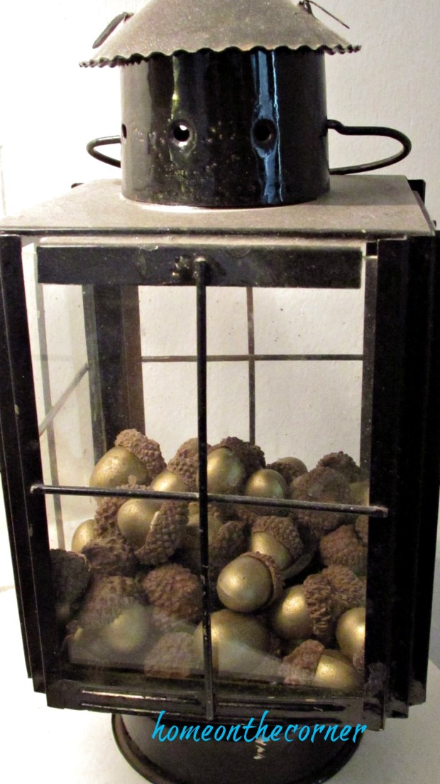 fall family room lantern with acorns