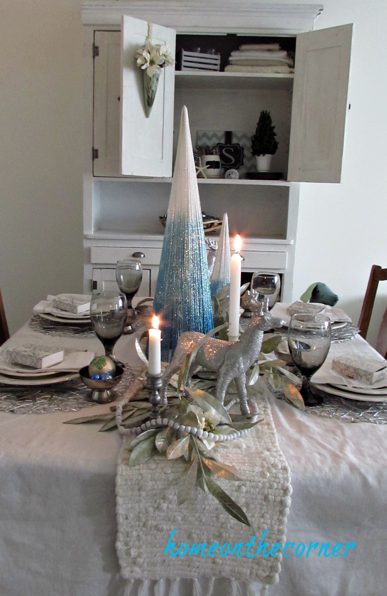christmas 2017 dining room turquoise and white tablescape and hutch