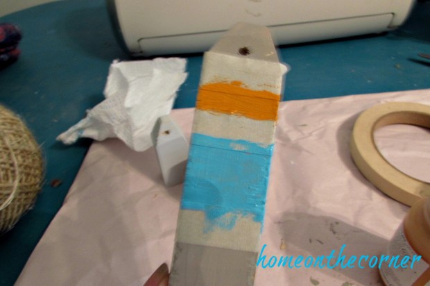 wooden buoy ornament taped and stripes