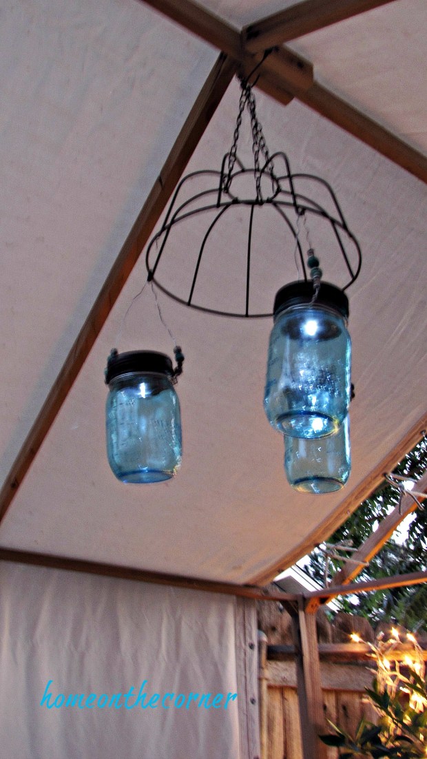 backyard gazebo nighttime mason jar lights