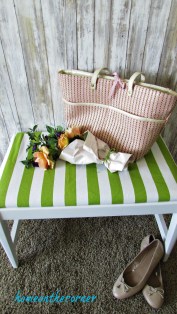 green and white striped bench pink purse