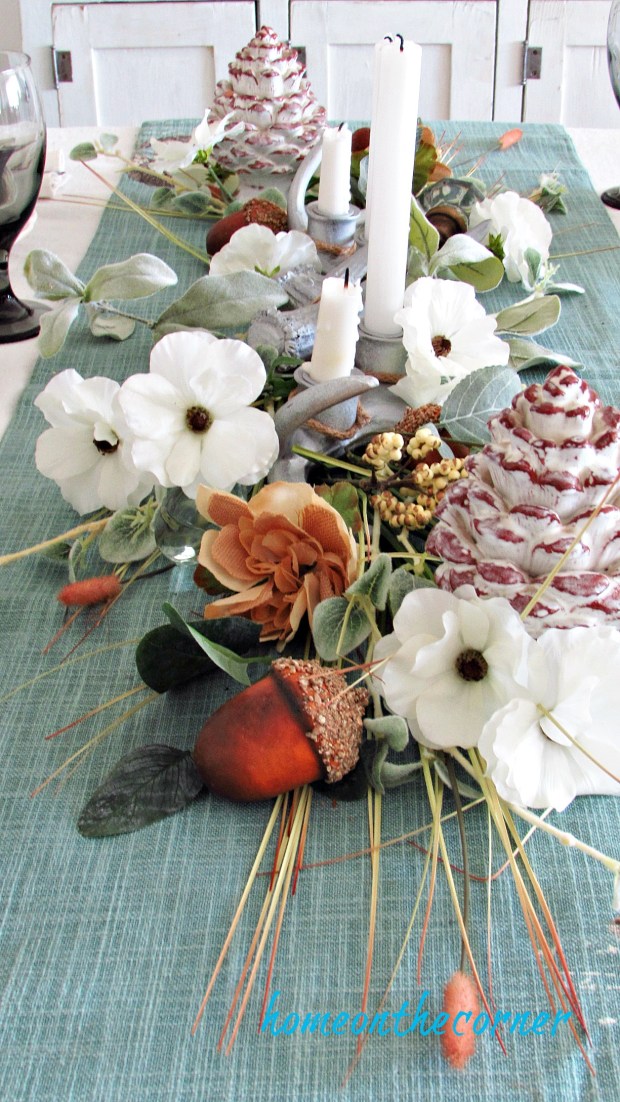 early fall dining room flowers and acorns centerpiece