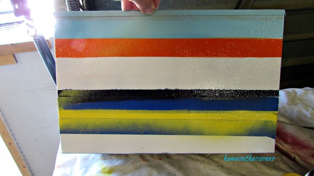 metal box spray paint stripes orange, turquoise