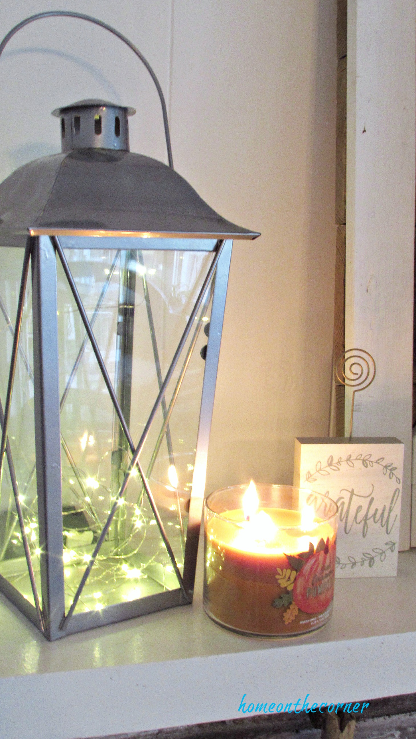 cream pumpkin fall mantle pumpkin candle and lantern